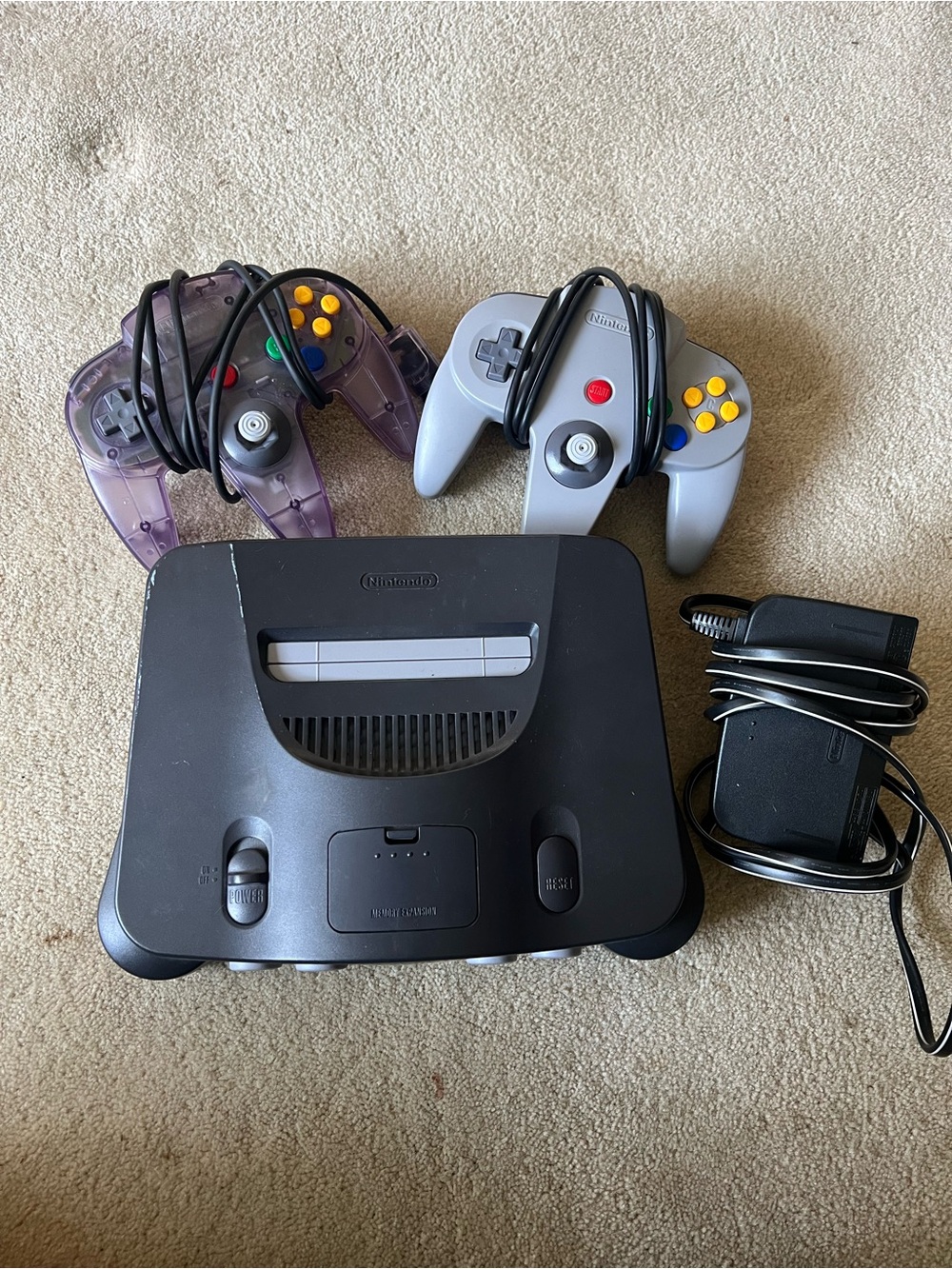 Vintage Nintendo N64 Console with Gray & Translucent Purple Controllers